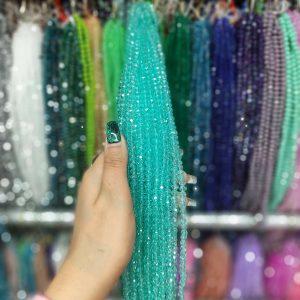 مهره کریستال تراش سایز 6رنگ آبی فیروزه ای هفت رنگ  (ریسه ای)