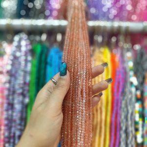 مهره کریستال تراش سایز 4 رنگ گلبهی هفت رنگ (ریسه ای)