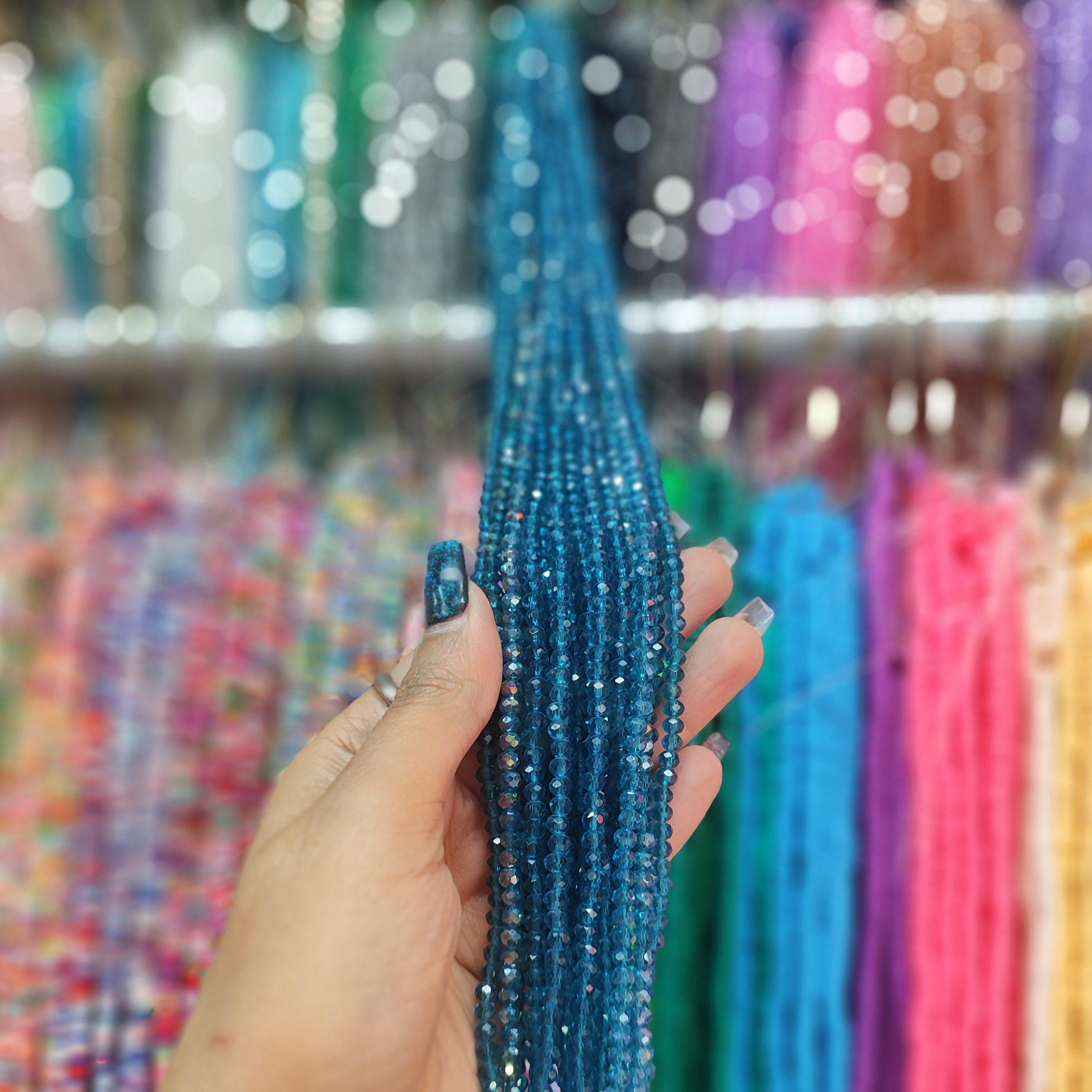 مهره کریستال تراش سایز 4 رنگ آبی شیشه ای (ریسه ای)