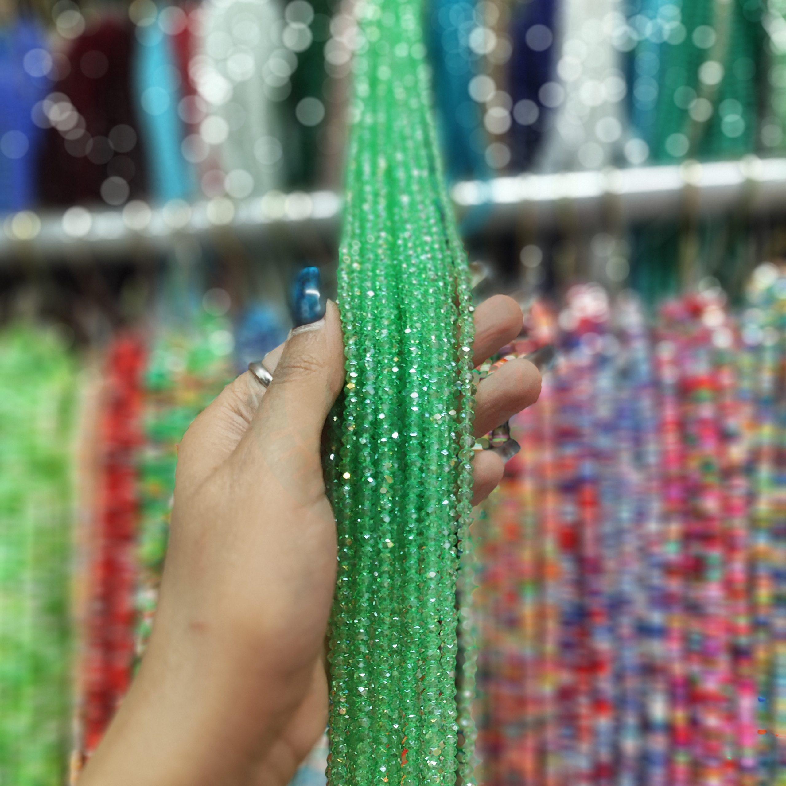مهره کریستال تراش سایز 4 رنگ سبز روشن هفت رنگ (ریسه ای)