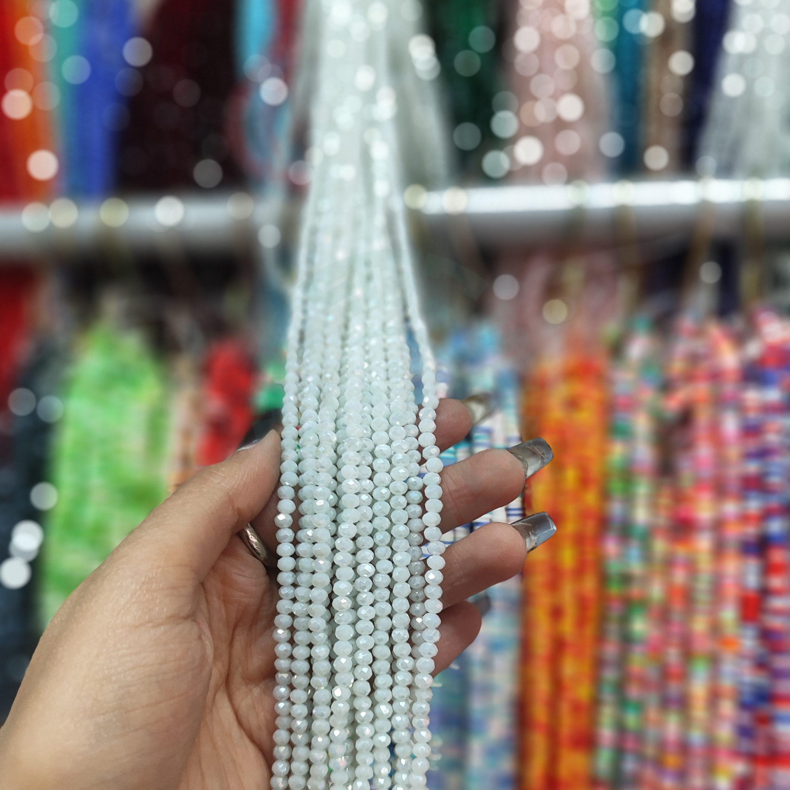 مهره کریستال تراش سایز 4 رنگ سفید مات هفت رنگ (ریسه ای)