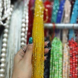 مهره کریستال تراش سایز 4 رنگ زرد شیشه ای (ریسه ای)
